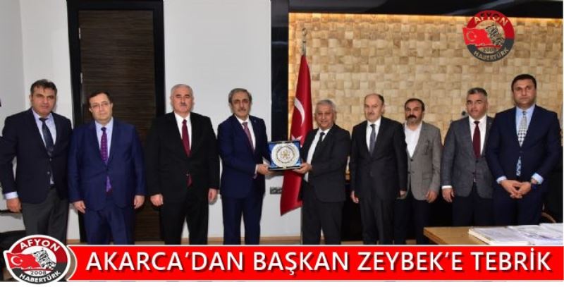 AKARCA’DAN BASKAN ZEYBEK’E TEBRIK